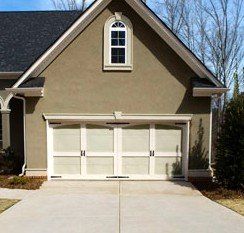 Garage Door Services — Brown Colored House With Garage in Virginia Beach, VA Garage Door Services — Brown Colored House With Garage in Virginia Beach, VA