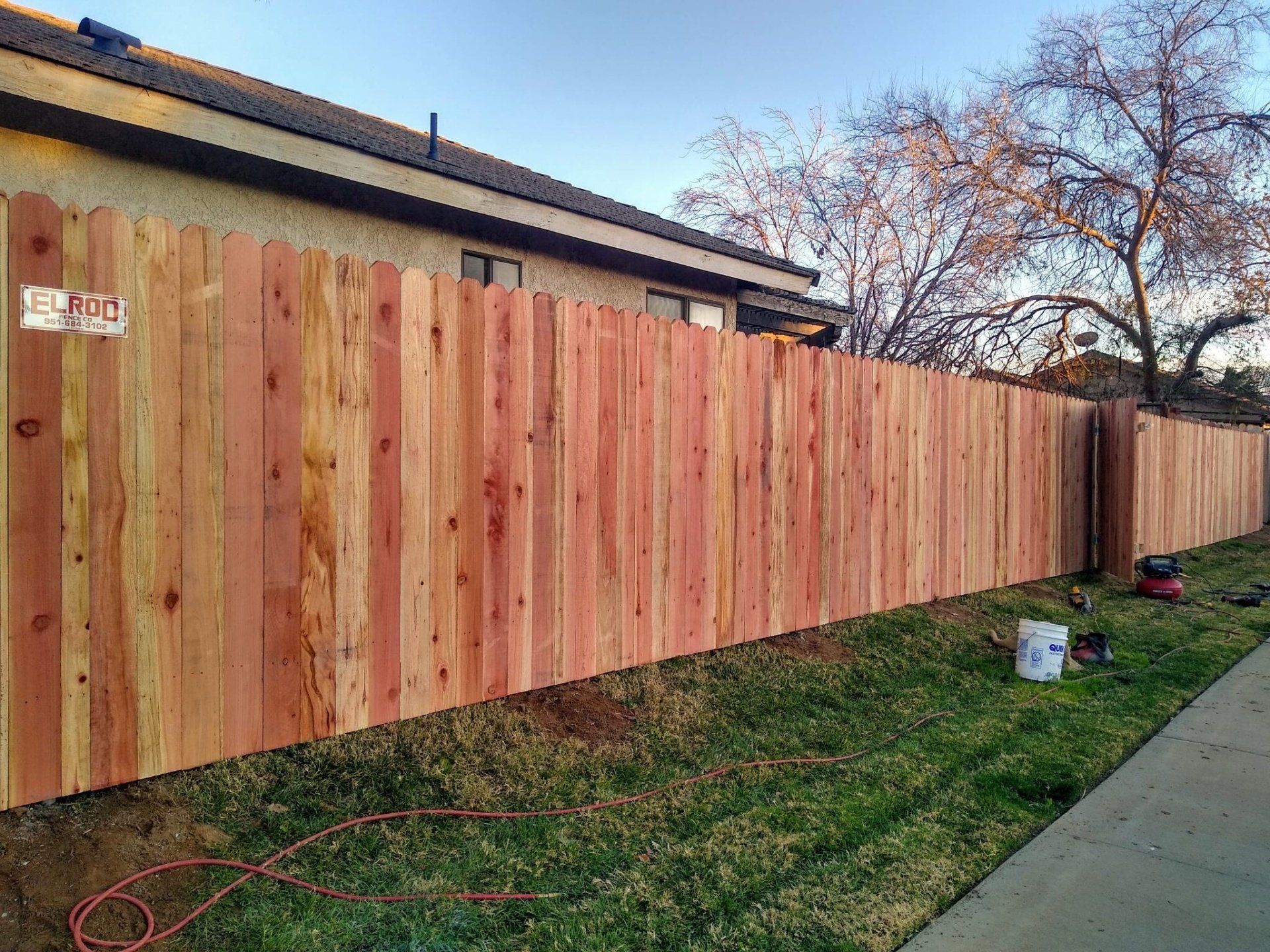 Wood Fence In The Backyard — Riverside, CA — Elrod Fence Co