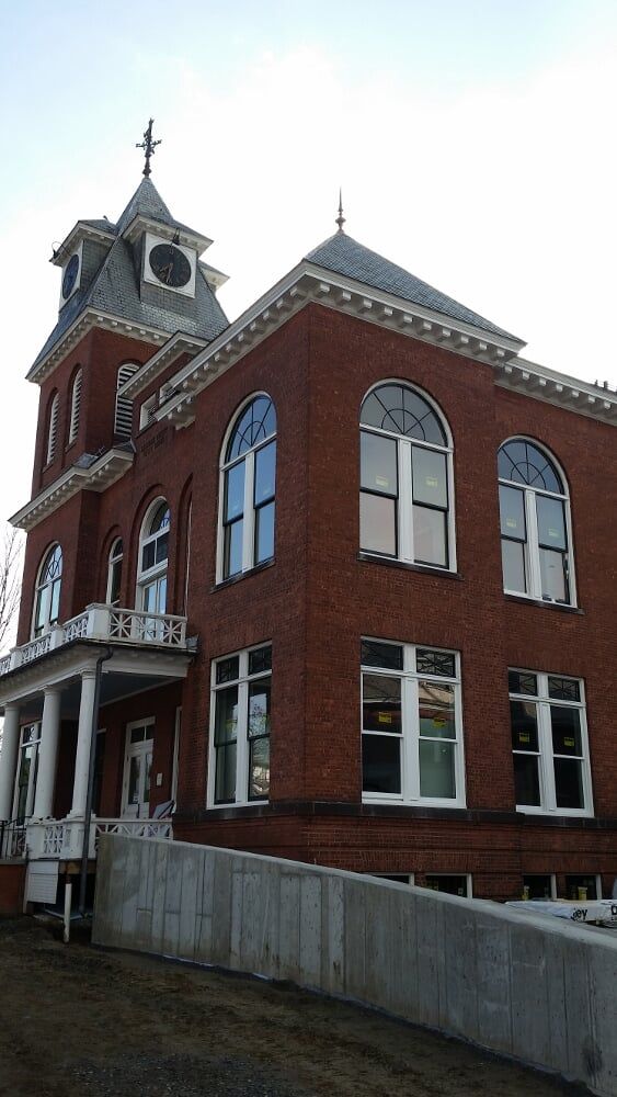 Orange buildingHouse—Hazardous Material Removal in Burlington, VT