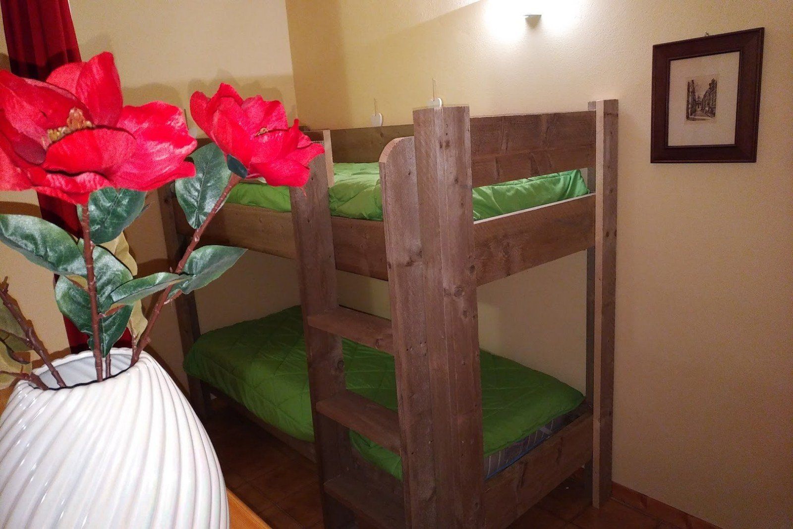 A bedroom with a bunkbed