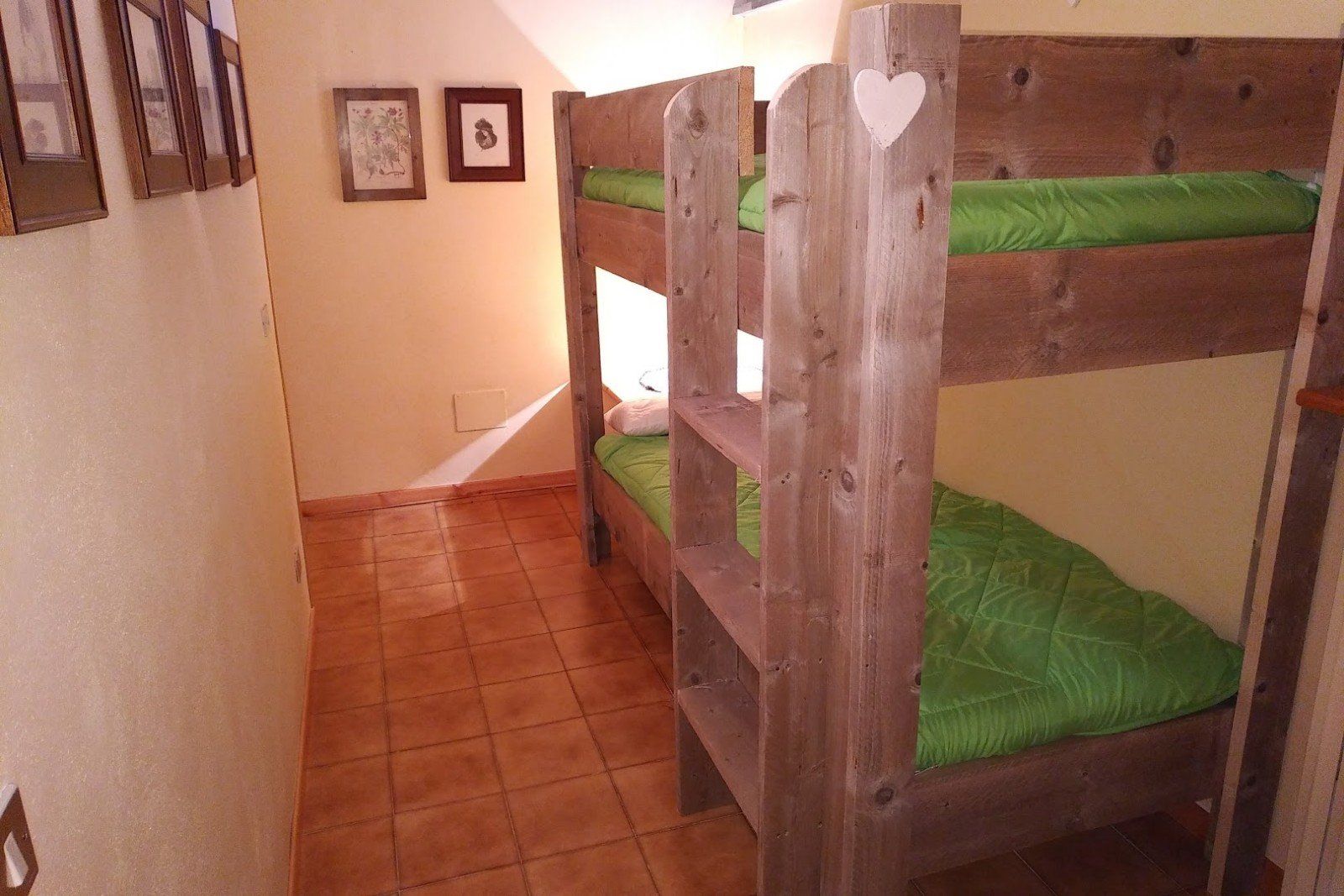 A bedroom with a bunkbed