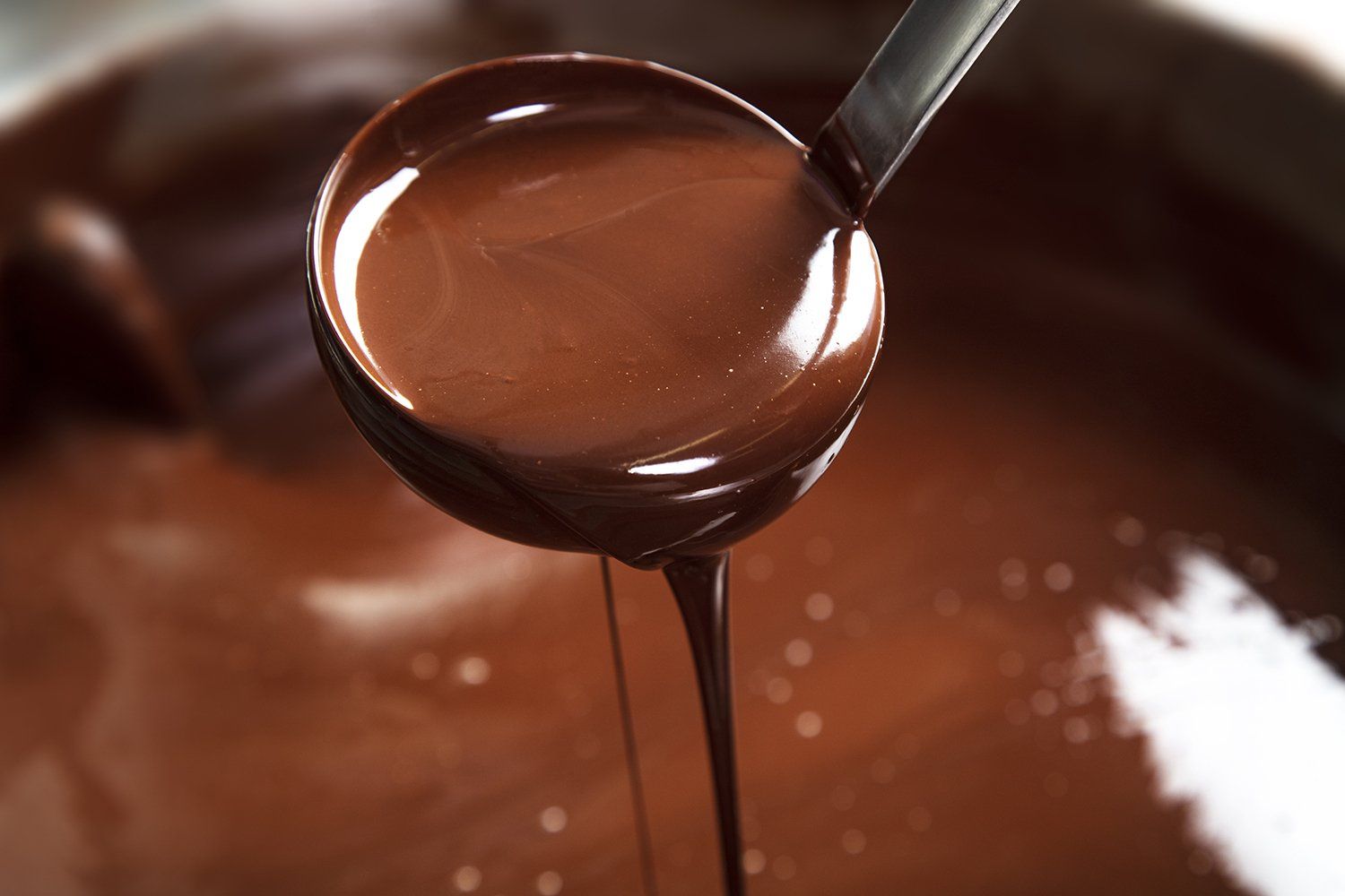 Guillaume Bichet preparing chocolates in his Geneva laboratory. The know-how of Geneva chocolate maker Guillaume Bichet
