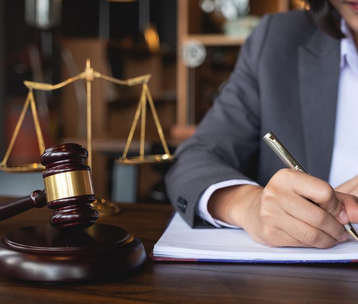 Attorney With Gavel And Scale On Table — Oklahoma City, OK — Murphy & Murphy Attorneys Attorney With Gavel And Scale On Table — Oklahoma City, OK — Murphy & Murphy Attorneys