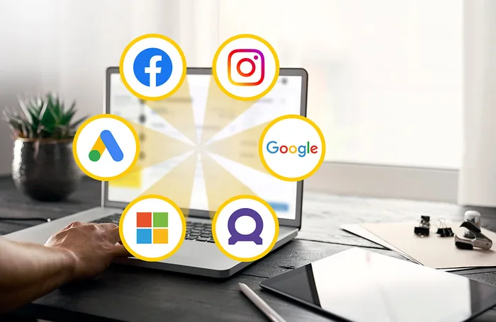 Image of laptop with logos of digital advertising channels