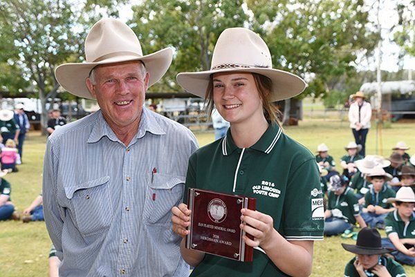 Limousin Society representative Graeme Wicks, Hillsborough Limousins, Kingaroy, presenting the 2016 Jean Plaisted memorial Herdsman award to Destiny Perrett, Brak-En-Way, Muswellbrook, NSW.  Photo courtesy Sarah Coulton.