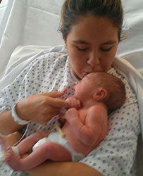 Woman After Giving Birth Kissing Her Child — A Child's Dream Woman After Giving Birth Kissing Her Child — A Child's Dream
