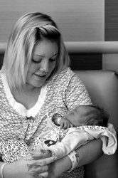 Woman Holding A New Born Child — A Child's Dream Woman Holding A New Born Child — A Child's Dream