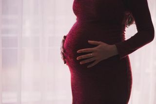 Pregnant Women Wearing Red Dress — A Child's Dream Pregnant Women Wearing Red Dress — A Child's Dream