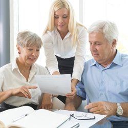 an elderly couple claiming their insurance