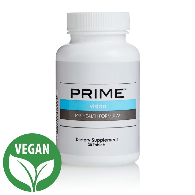 A white bottle of prime vision dietary supplement