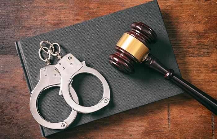 Handcuffs and Gavel — Louisville, KY — Connelly Kaercher Law Offices Handcuffs and Gavel — Louisville, KY — Connelly Kaercher Law Offices