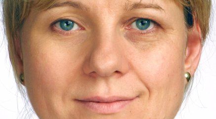 A lady with a face clear of makeup