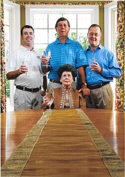 Family holding a glass of water — Water Filters in Magnolia, NC