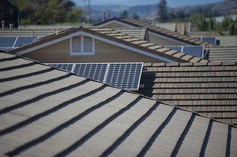 Roof with solar panels — Indianapolis, IN — Rain-Flow Gutters