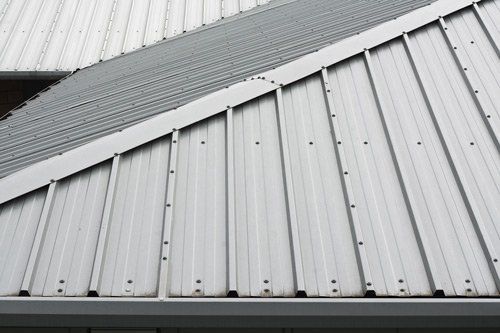 Fastened metal roof — Indianapolis, IN — Rain-Flow Gutters Fastened metal roof — Indianapolis, IN — Rain-Flow Gutters