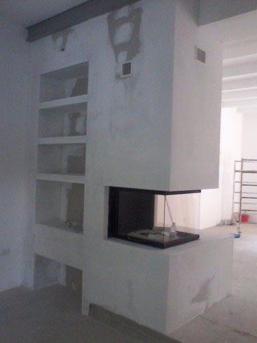 parete divisoria e scaffali realizzati in cartongesso