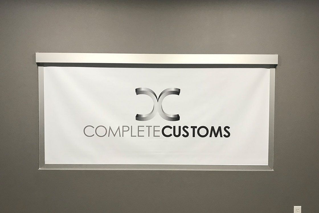 complete customs logo