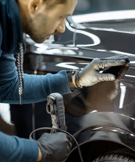 Mechanic Painting Car — Norwalk, CA — Troy & Bobs Auto Works Mechanic Painting Car — Norwalk, CA — Troy & Bobs Auto Works