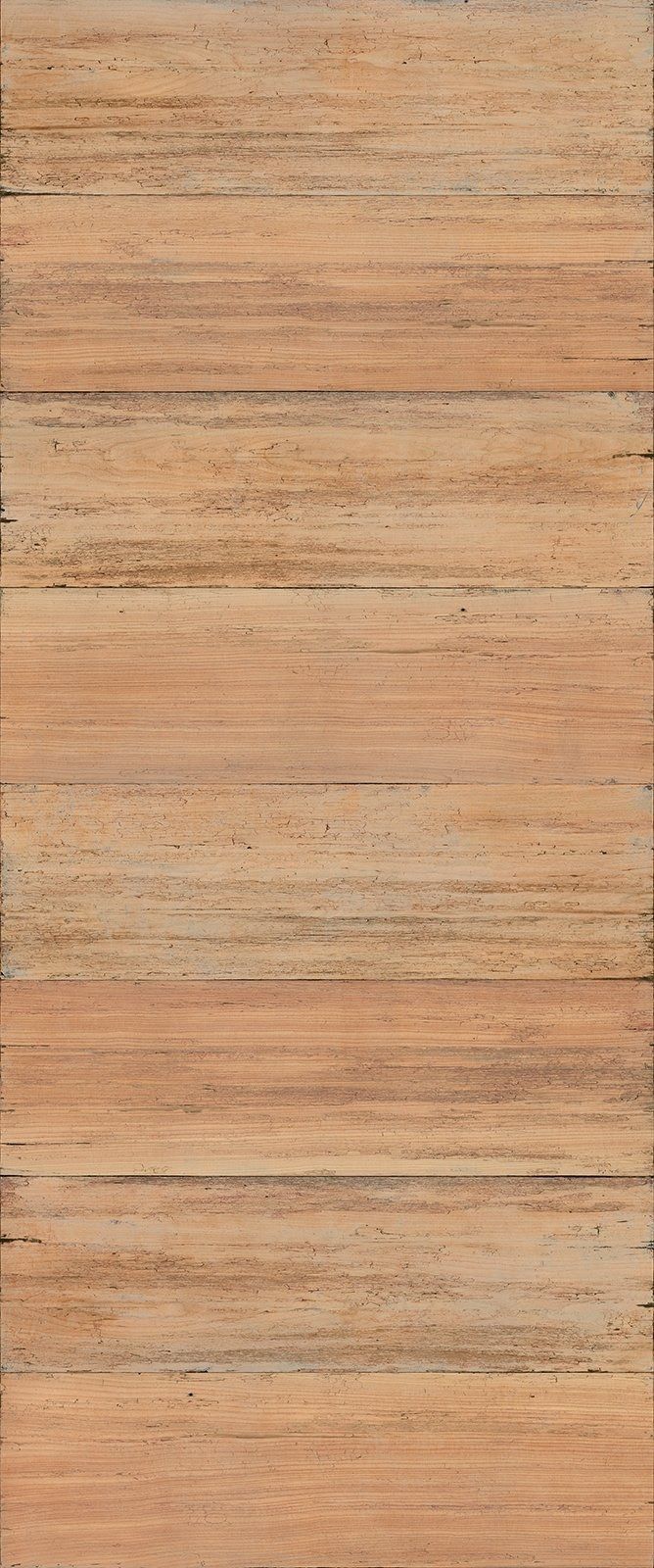 Wooden plank surface, light brown with horizontal grain and dark speckling.