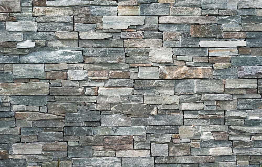 Gray and brown stone brick wall.
