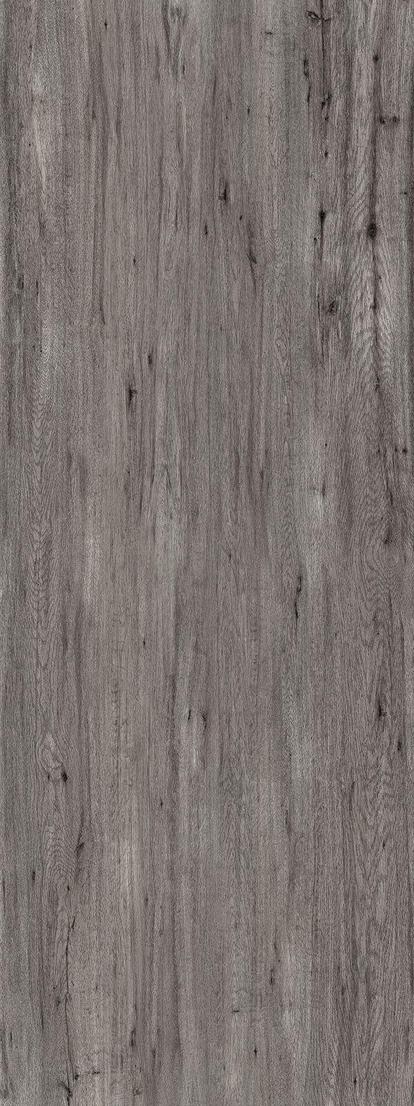 Close-up of a weathered, gray wood texture with vertical grain.