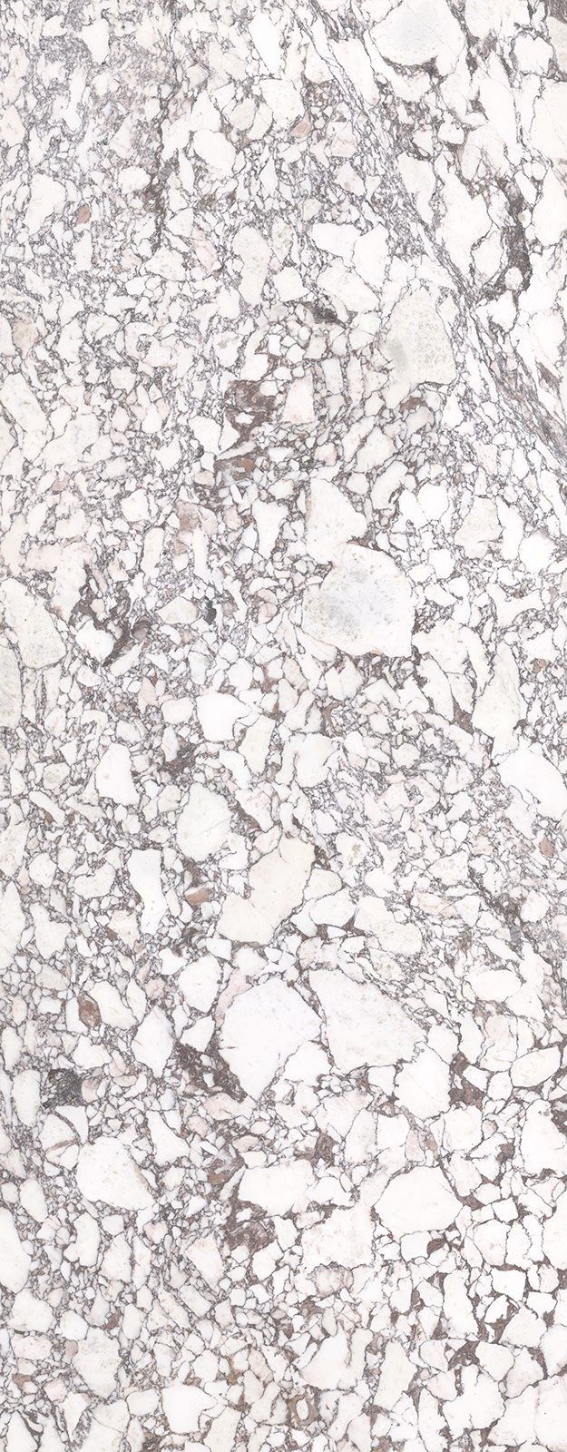 White and gray marble slab with irregular patterns, resembling broken pieces.