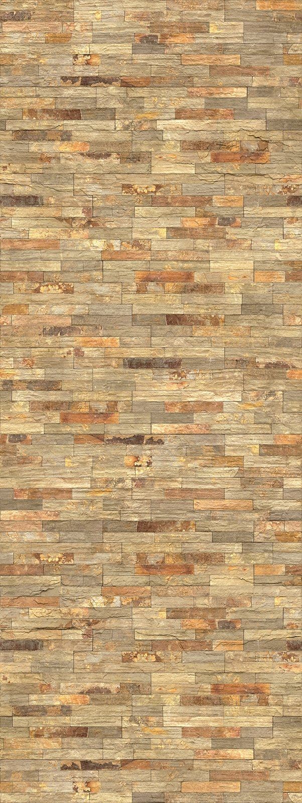 Close-up of a wall made of rectangular, rough-cut stone tiles in shades of beige, brown, and tan.