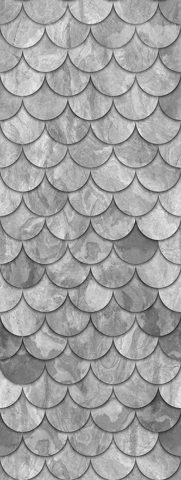 Gray overlapping scallop-shaped tiles, forming a textured pattern.
