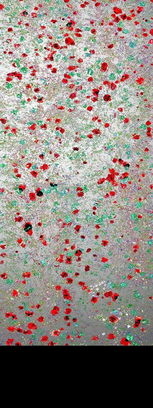 Silver glitter background with scattered red and green droplets.