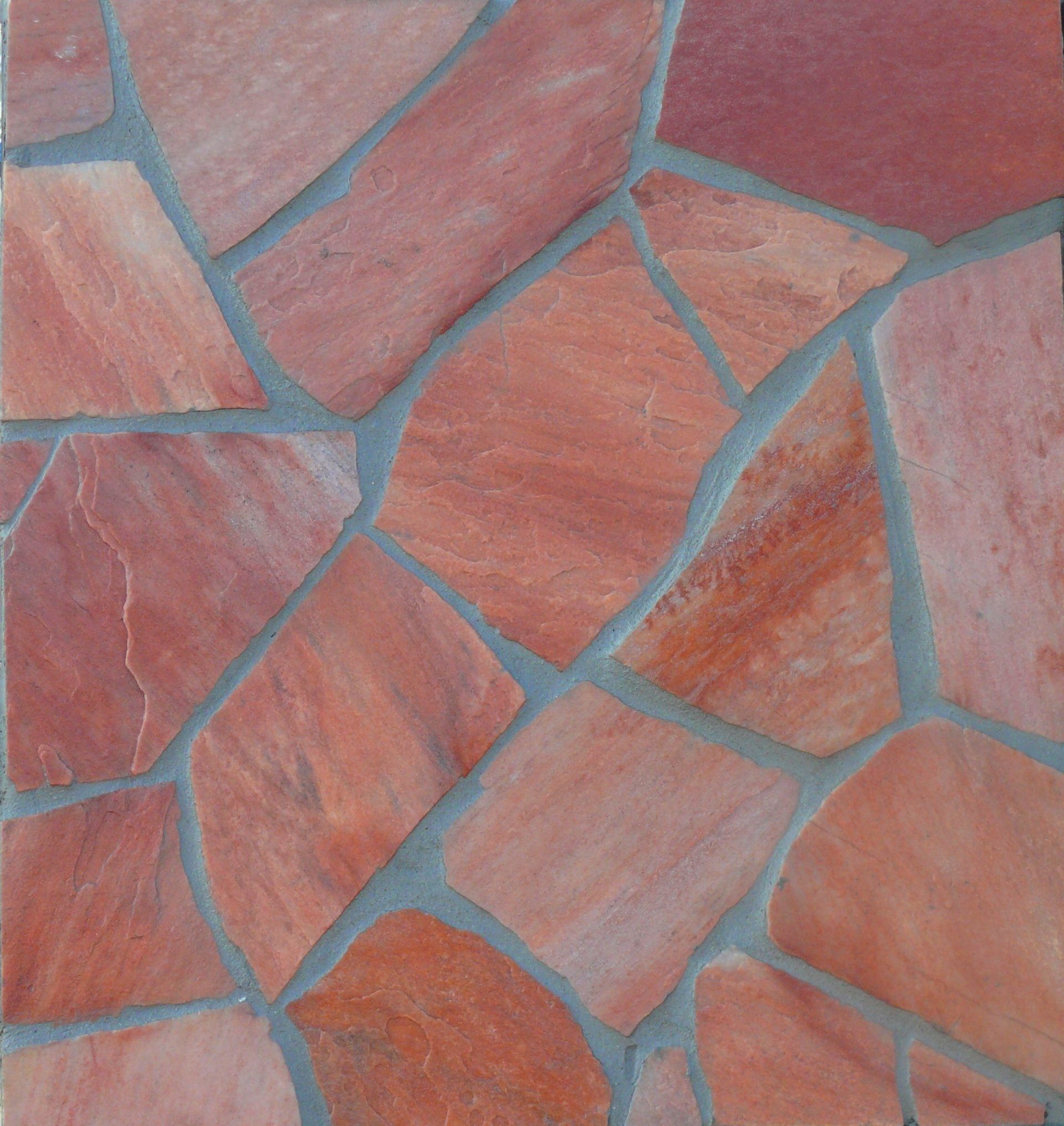 Red flagstone patio tiles with gray grout.