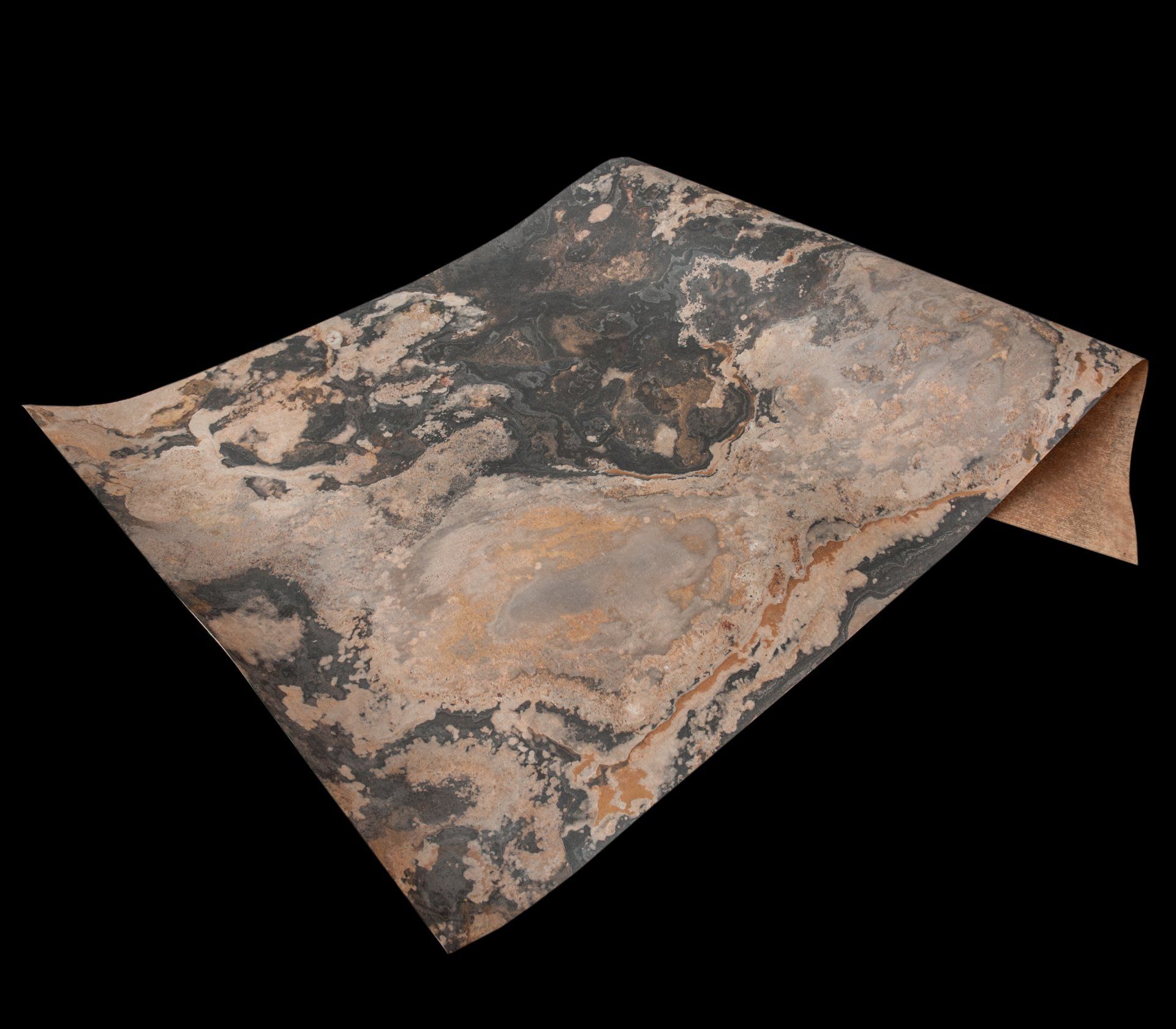 A flexible sheet of material with a marbled, brown, and black stone pattern, partially curled up.