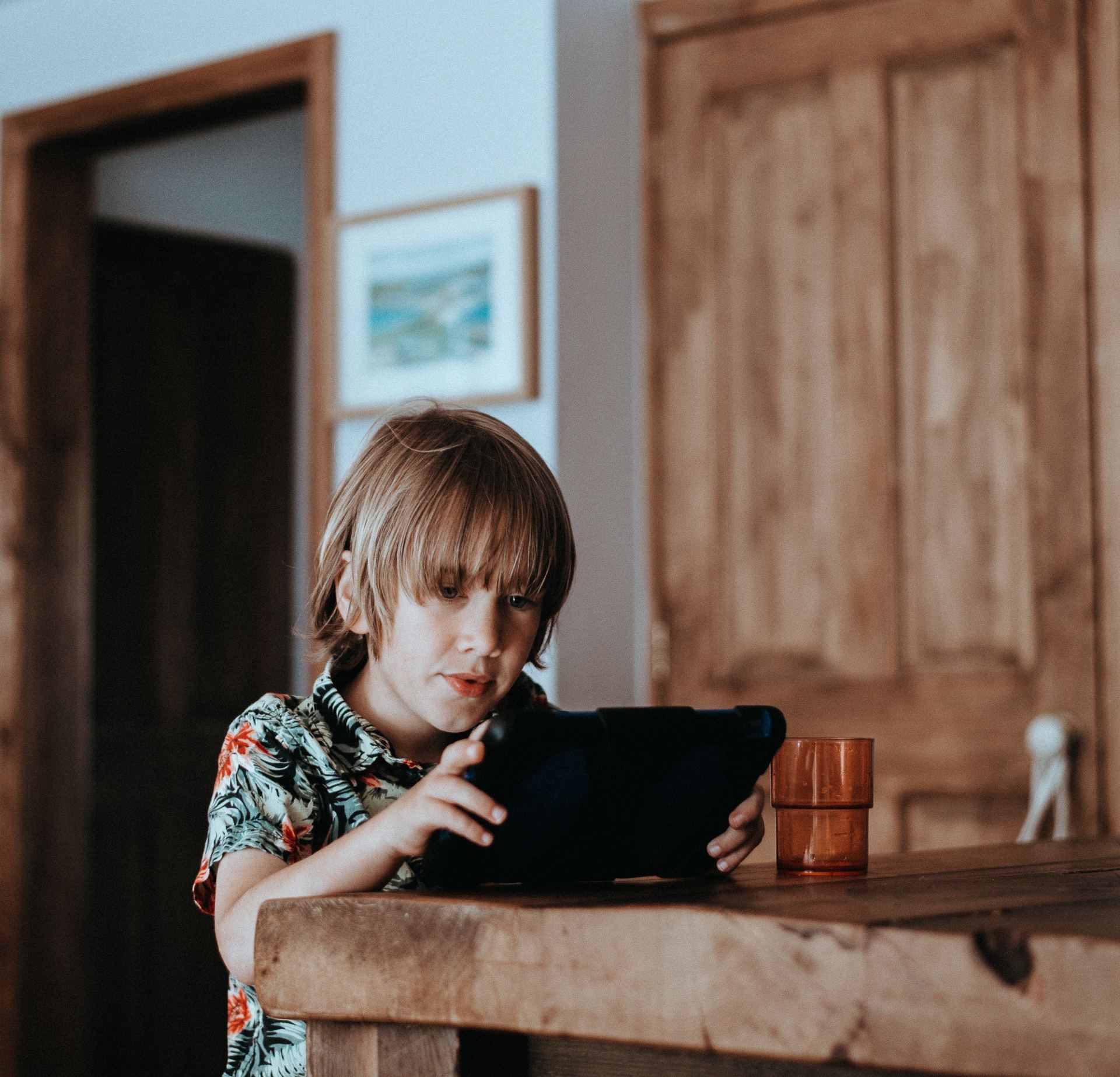 Child Playing in Tablet | New Connections Nashville, TN