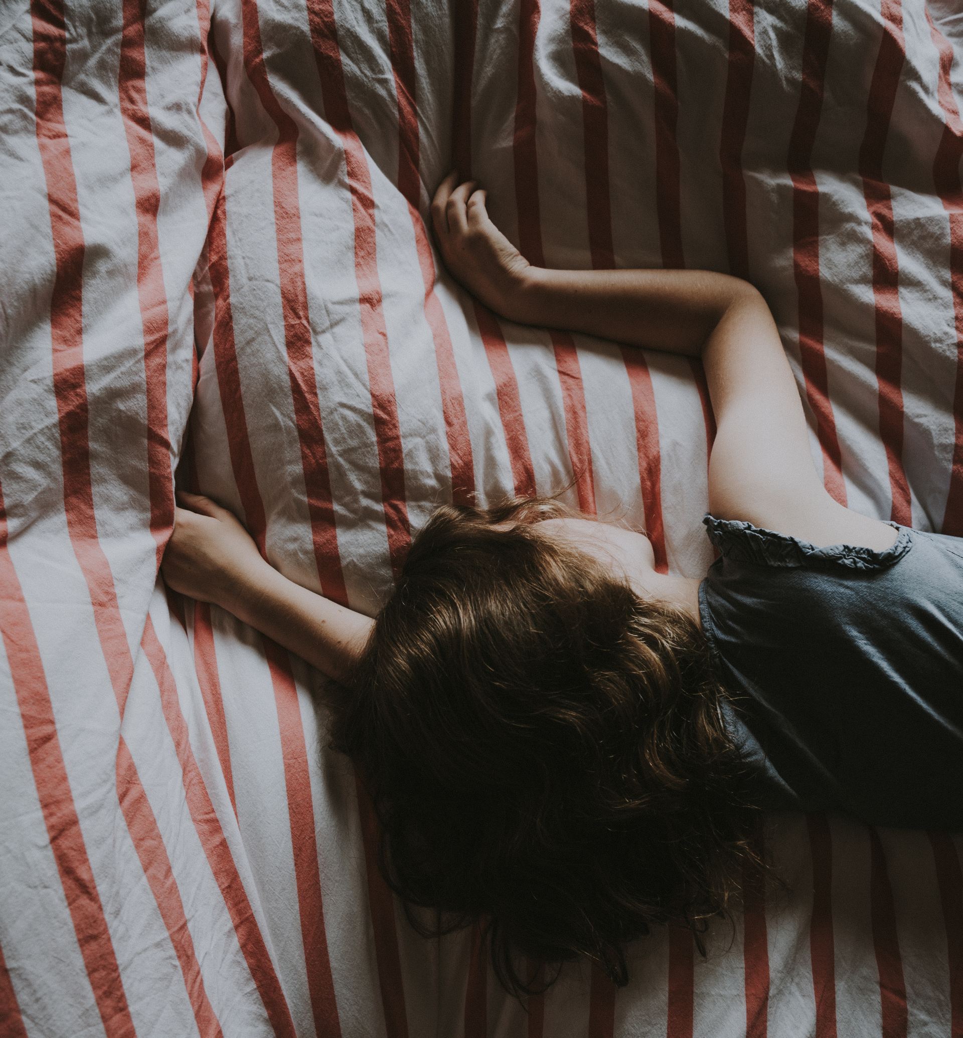 Child on Bed | New Connections Nashville, TN
