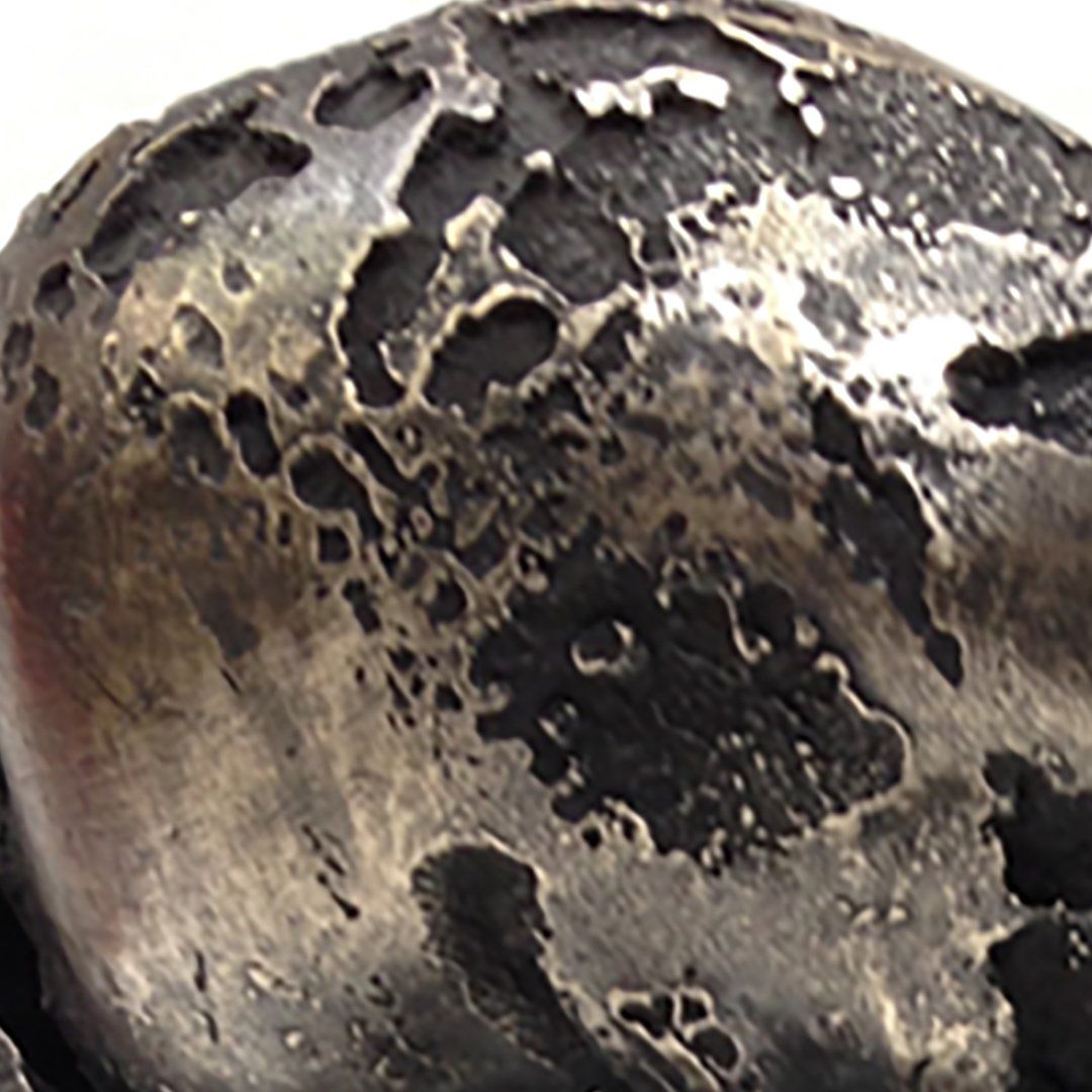 A close up bronze textural surface.