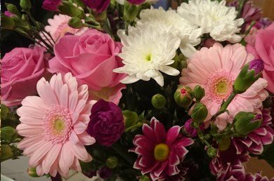 bunch of a variety of pink flowers