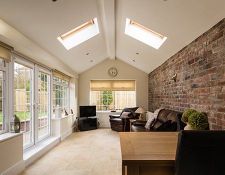 Modern Sunroom with a Brick Wall — Youngstown, OH — A.R. McClung Construction Modern Sunroom with a Brick Wall — Youngstown, OH — A.R. McClung Construction