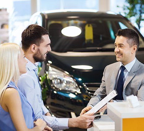 Young couple in consultation for car loan