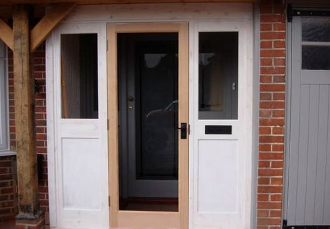stunning wooden doors installed in porch