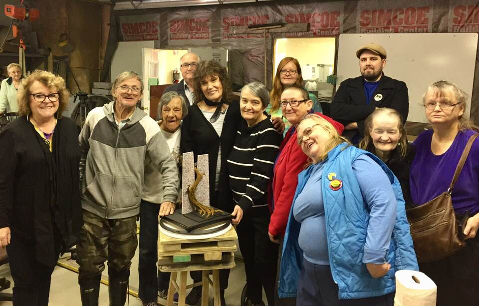 Members of Remember Every Name came together at Signature Memorials in Orillia for the unveiling of the maquette. Artist Hilary Clark Cole was there to present it to the survivors from feedback given at the various meetings with survivors in the past year. Members of Remember Every Name came together at Signature Memorials in Orillia for the unveiling of the maquette. Artist Hilary Clark Cole was there to present it to the survivors from feedback given at the various meetings with survivors in the past year.