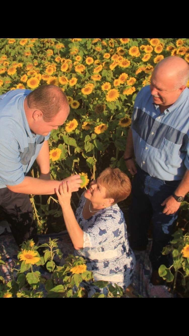 Ben giving Donna a sunflower