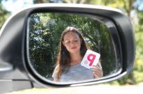 Man and girl in a car driving
