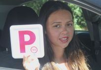 Woman behind wheel of a car