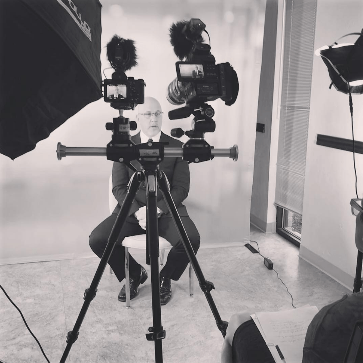black and white behind the scene doctor interview, backdrop, two camera, photography lighting (enid oklahoma)