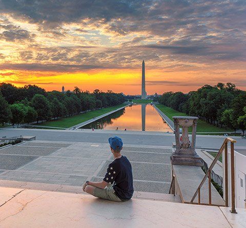 Call Center Agents — Man Looking at Washington Monument in Calabasas, CA