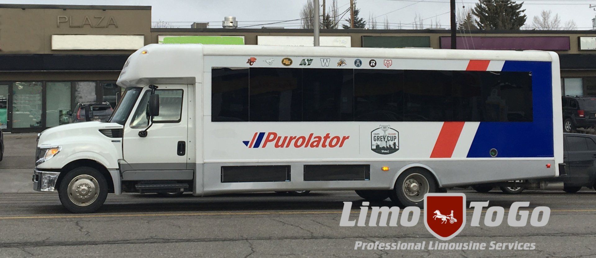 Corporate Function Limo and Shuttle Transfer Service corporate event in hall with people gathered