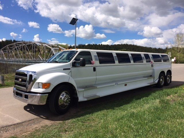 Limo To Go white 28 passenger stretch truck Mammoth limousine