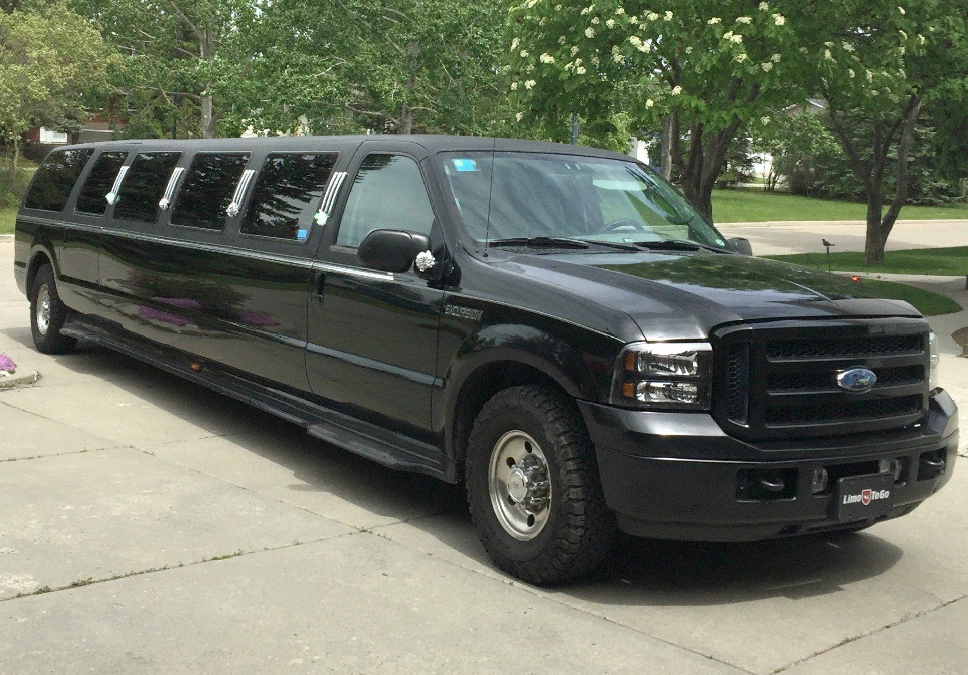 black Limo To Go 14 passenger stretch SUV limousine