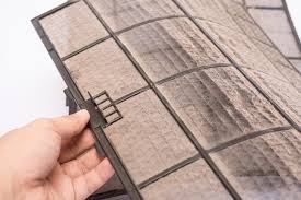 removing aircon filters.