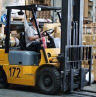 Worker operating a forklift — Construction Rentals in New Castle, Pennsylvania Worker operating a forklift — Construction Rentals in New Castle, Pennsylvania