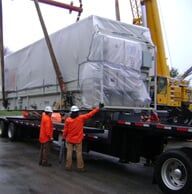 Men working with truck cargo — Construction Rentals in New Castle, Pennsylvania Men working with truck cargo — Construction Rentals in New Castle, Pennsylvania